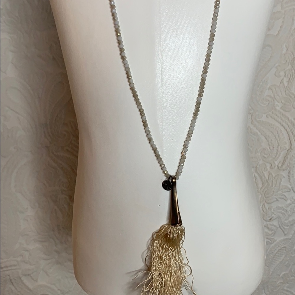 Long beaded necklace with fringe
